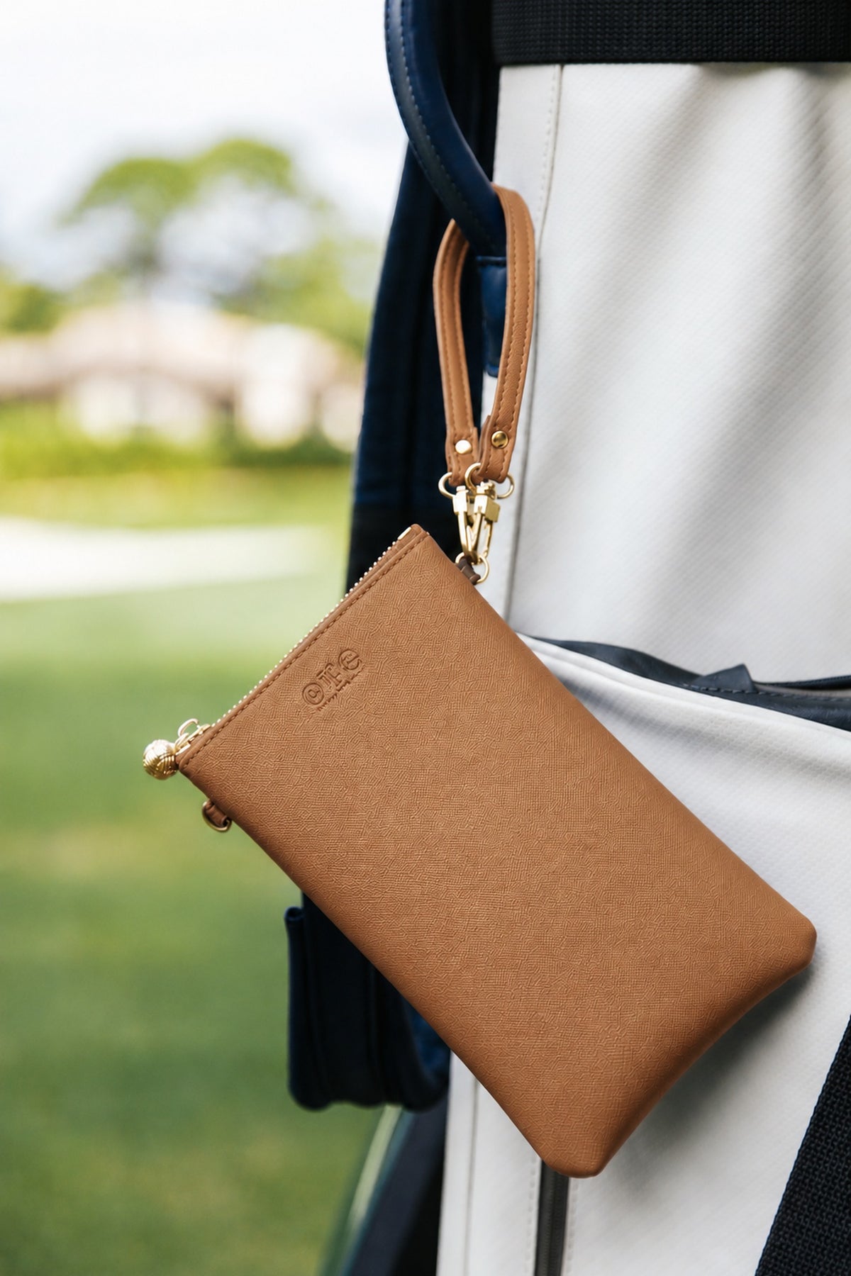 #1 Tan KF Paw Crossbody Wristlet